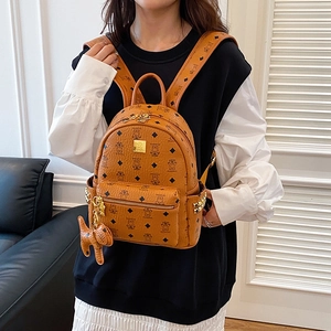 Brown mini leather backpack featuring cute bear print and golden studs with bear charm