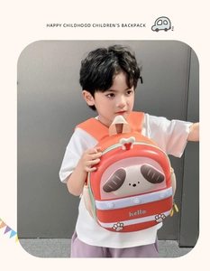 Toddler wearing a bright orange EVA cartoon dog backpack with 3D details and shell design