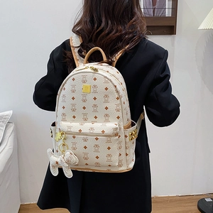 Cute bear print mini backpack in cream with brown leather trim and golden metal studs