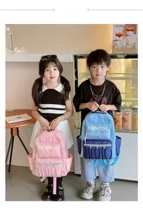 Close-up of stylish contrast color kids backpacks in pink and blue for school students