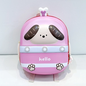 Detail of the pink EVA hardshell cartoon backpack featuring a 3D puppy face and handle
