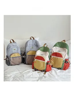 Detail view of multi-color children backpacks in large and small sizes for outdoor use