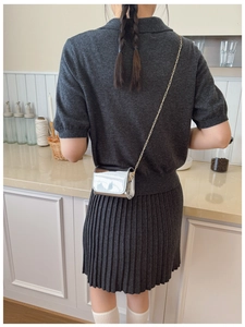Kids mini crossbody bag with silver mirror finish and elegant gold chain strap detail