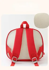 Detail of red toddler backpack with breathable mesh back and wide padded straps