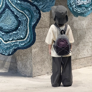 Kids purple and grey drawstring backpack with elastic cord mesh for outdoor activities