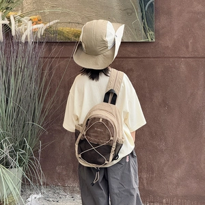 Outdoor stylish color-block kids backpack with drawstring design and matching sun hat