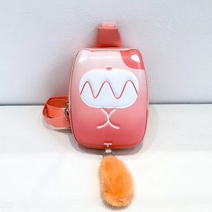 Close-up of children's hard shell chest bag with gradient pink design and plush tail detail