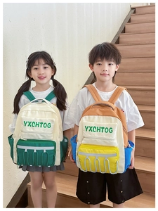 Detail of Korean style kids school bag with contrasting colors and drawstring design