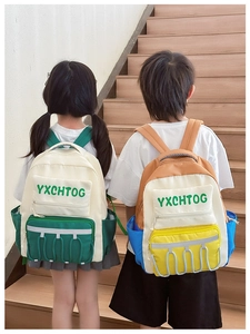 Kids backpack showing functional side pockets and adjustable straps in a lifestyle scene