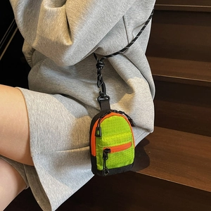 Mini porte-monnaie enfant style sac à dos en nylon contrasté vert fluo et orange