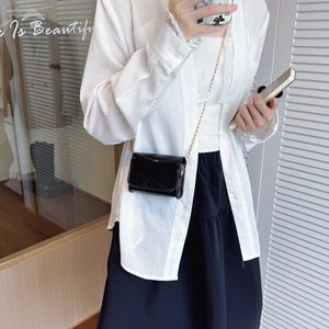 Minimalist black patent leather mini crossbody bag with gold chain strap for kids