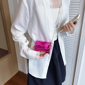 Chic neon pink glossy mini crossbody bag for kids with elegant gold chain strap
