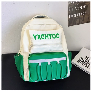Close-up of color-block canvas backpack featuring zippered front pocket and side bottle holder