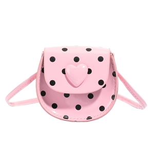Pink heart crossbody bag for girls with black polka dots and shiny leather finish