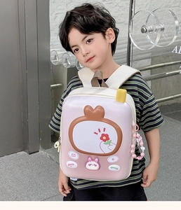 Detailed front view of 3D hardshell kids backpack with purple vintage TV design