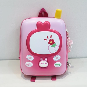 Detail view of pink hardshell kids backpack featuring retro TV and rabbit design elements