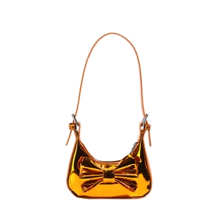 Kids metallic orange bow handbag with glossy mirror finish and sweet shoulder strap