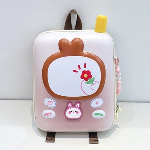 Detail of pink egg-shell toddler backpack with cute bunny 3D design and star charm