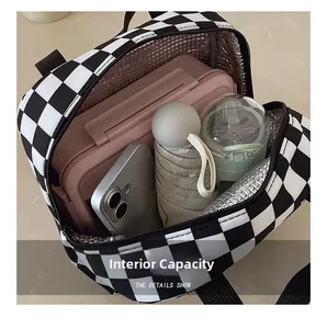 Detail view of large plaid lunch bag showing internal capacity with thermal foil lining