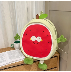 Detail of cute 3D cartoon watermelon backpack with plush limbs and smiling face print
