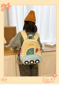 Detail view of cartoon excavator kids backpack with adjustable straps and front pocket