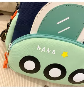 Detail of color-block kids backpack with Nana letters, stars and orange zipper cord