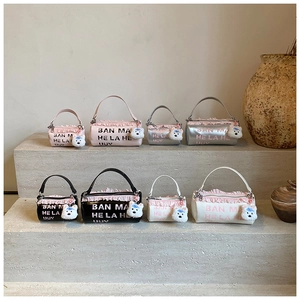 Sacs barils pour enfants en rose, argent, noir et blanc avec dentelle et charms chiots