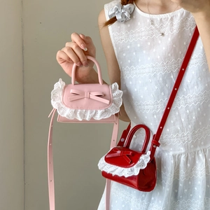 Mini PU leather crossbody bag with cute bow, lace trim and adjustable shoulder strap