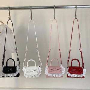 Mini PU leather crossbody bags with cute bow and lace detail in black white pink and red