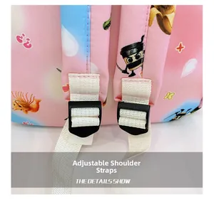 Detail view of the adjustable white shoulder straps with durable black buckles on kids backpack