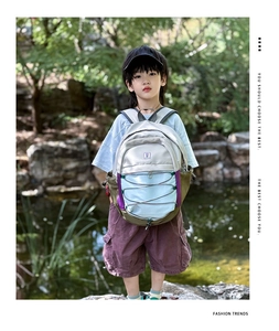 Detail view of colorful ergonomic straps and breathable mesh padding on kids backpack