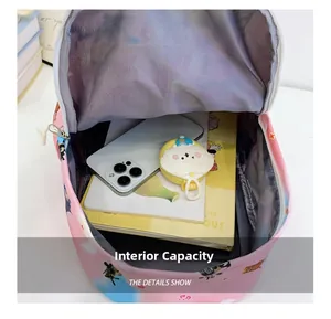Detail view of the pink cartoon schoolbag showing spacious internal main compartment capacity