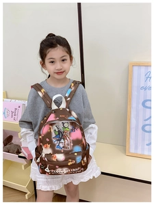 Close-up of cute cartoon backpack for kids showing durable canvas texture and print details