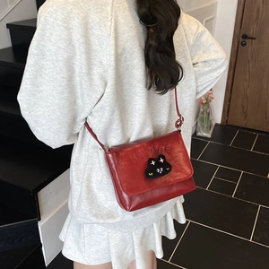 Cute red kids crossbody bag with cartoon cat plush patch and stylish letter embroidery