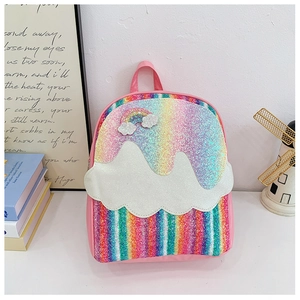 Detail of pink toddler backpack featuring colorful glitter sequins and rainbow cloud patches