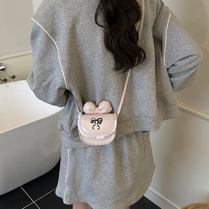 Mini pink girls crossbody bag with cute ribbon bow and delicate white lace trim