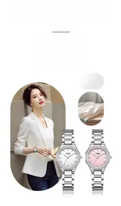Close-up of minimalist GEDI bracelet watch with rhinestone bezel and slim steel band