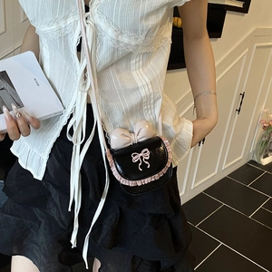Mini girls crossbody bag with pink bow, lace trim and black leather strap detail
