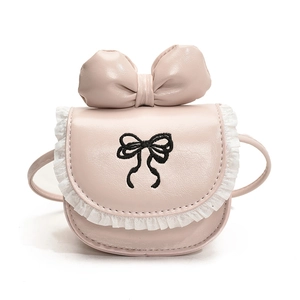 Pink girl's crossbody bag with large bow and white lace trim, cute PU leather kids accessory