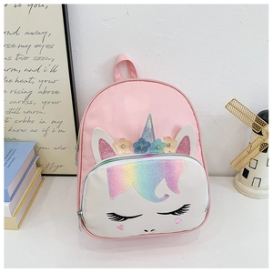 Detail showing 3D unicorn horn, glittery flowers and sleeping face on kids PU backpack