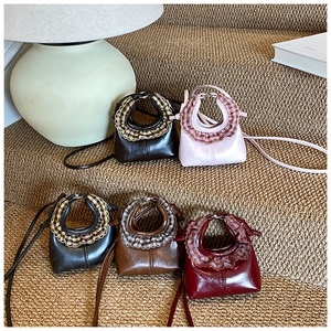 Detailed view of cloud bag variety with plaid frill handles and slim shoulder straps