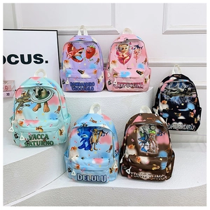 Six colorful cartoon children's backpacks with surrealist prints on a modern white display