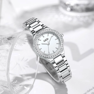 Silver women's steel watch with rhinestone bezel and white round dial for office wear