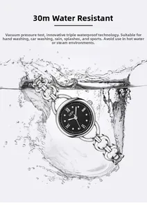 Waterproof women's watch in silver with black dial splashing in water for feature test