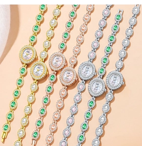 Detailed view of GEDI quartz bracelet watches featuring crystal bezels in diverse colors