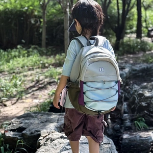 Lightweight color-block kids backpack with elastic cords for outdoor and school use