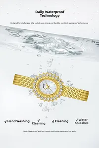 Waterproof gold quartz watch featuring a rhinestone bezel and textured oval dial in water