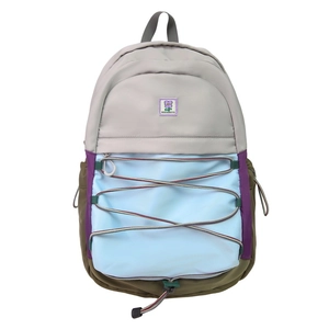 Outdoor color-block kids backpack in grey, blue, and purple with bungee cord detail