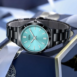 Montre minimaliste en acier inoxydable noir avec cadran turquoise vif pour femme
