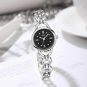 Elegant silver GEDI watch with black dial and crystal accents on open-link bracelet
